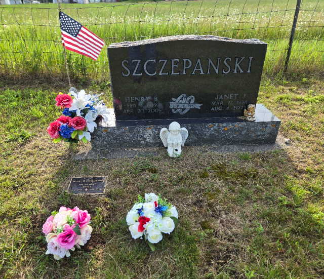 Breast Cancer Awareness arrangement at a grave