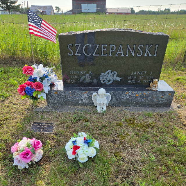 Breast Cancer Awareness arrangement at a grave