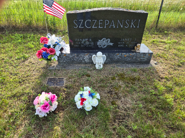 Breast Cancer Awareness arrangement at a grave