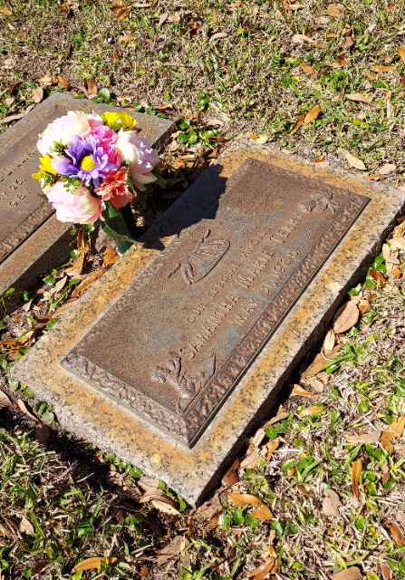 Red & White Roses arrangement at a grave