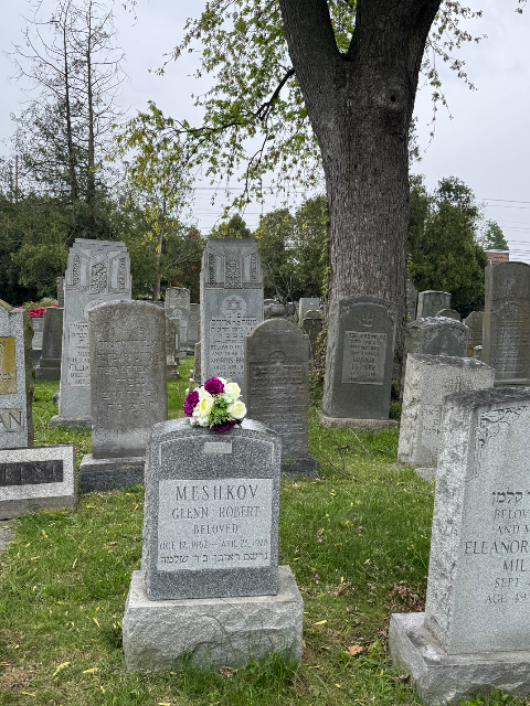 Purple Arrangement arrangement at a grave