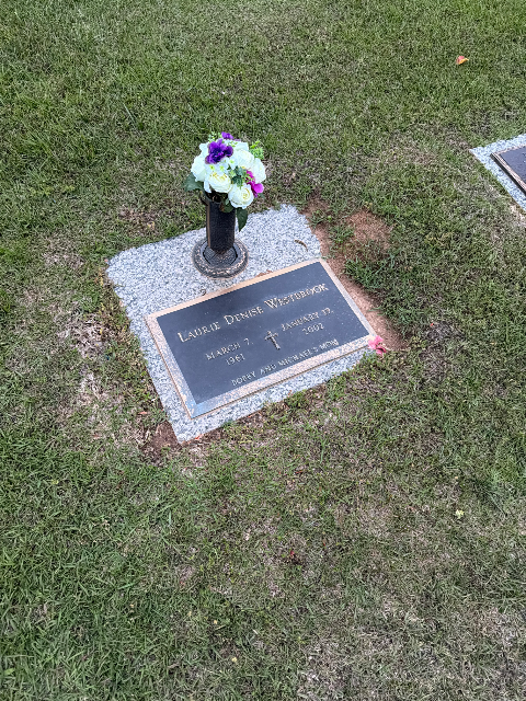Purple Arrangement arrangement at a grave