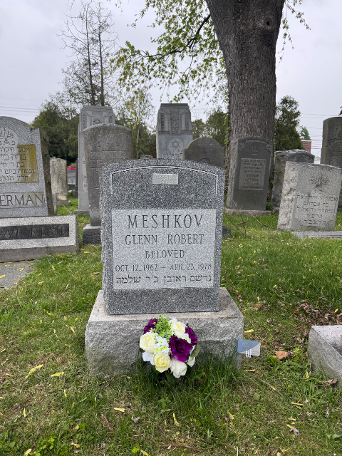 Purple Arrangement arrangement at a grave