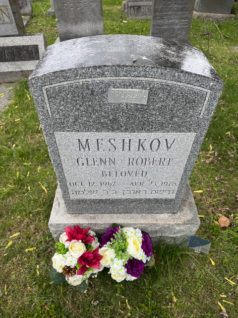 Purple Arrangement arrangement at a grave
