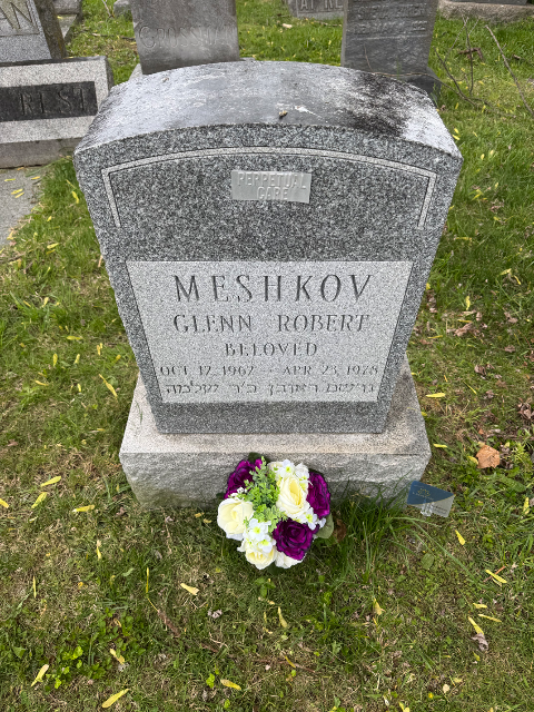 Purple Arrangement arrangement at a grave