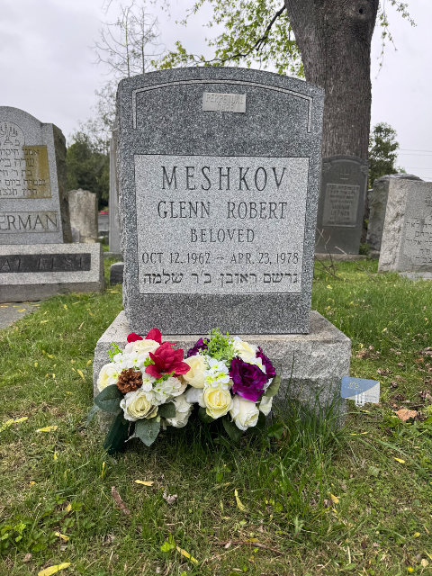 Purple Arrangement arrangement at a grave