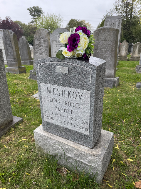 Purple Arrangement arrangement at a grave