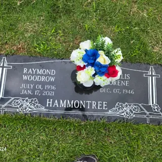 Flowers placed at a grave by a BloomBridge runner