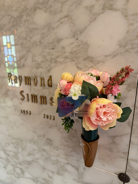 Flower delivery for Raymond J. Simms