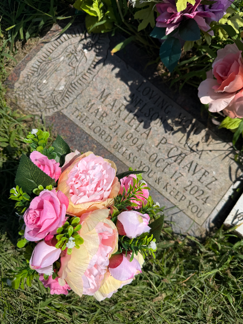 Flowers placed at the grave of Mariela P Chavez De Marinez, Holy Sepulchre Catholic Cemetery