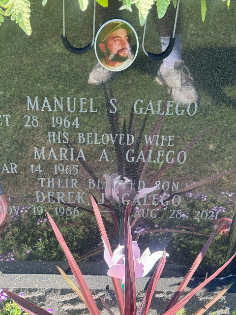 Flowers placed at the grave of Derek J. Galego, Saint Mary's Cemetery