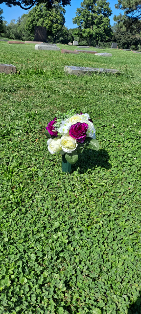 Flowers placed at the grave of Frank Puszczenski, Calvary Cemetery